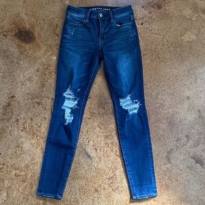 American Eagle Outfitters Next level Stretch dark wash High rise distressed jean
